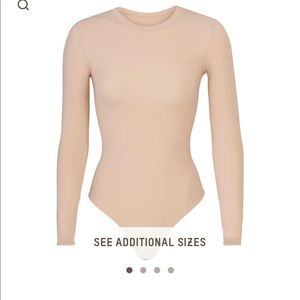 SKIMS NUDE BODY SUIT NEVER BEEN WORN